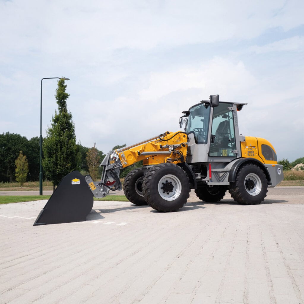 - Uitgebreide afbeelding van een moderne wiellader voor grondverzet en bouwprojecten.