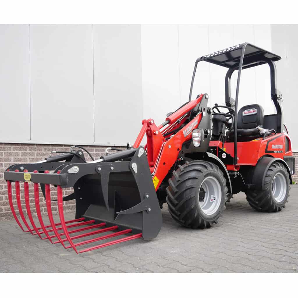 Efficiënte mini shovel met forklifthaard voor tuin- en bouwprojecten.