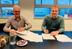 Innovatieve zakelijke samenwerking tussen twee professionals bij Geert-Jan de Kok B.V.