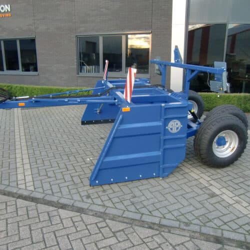 Krachtige blue graafmachine met grote banden voor landbouw of grondverzet.